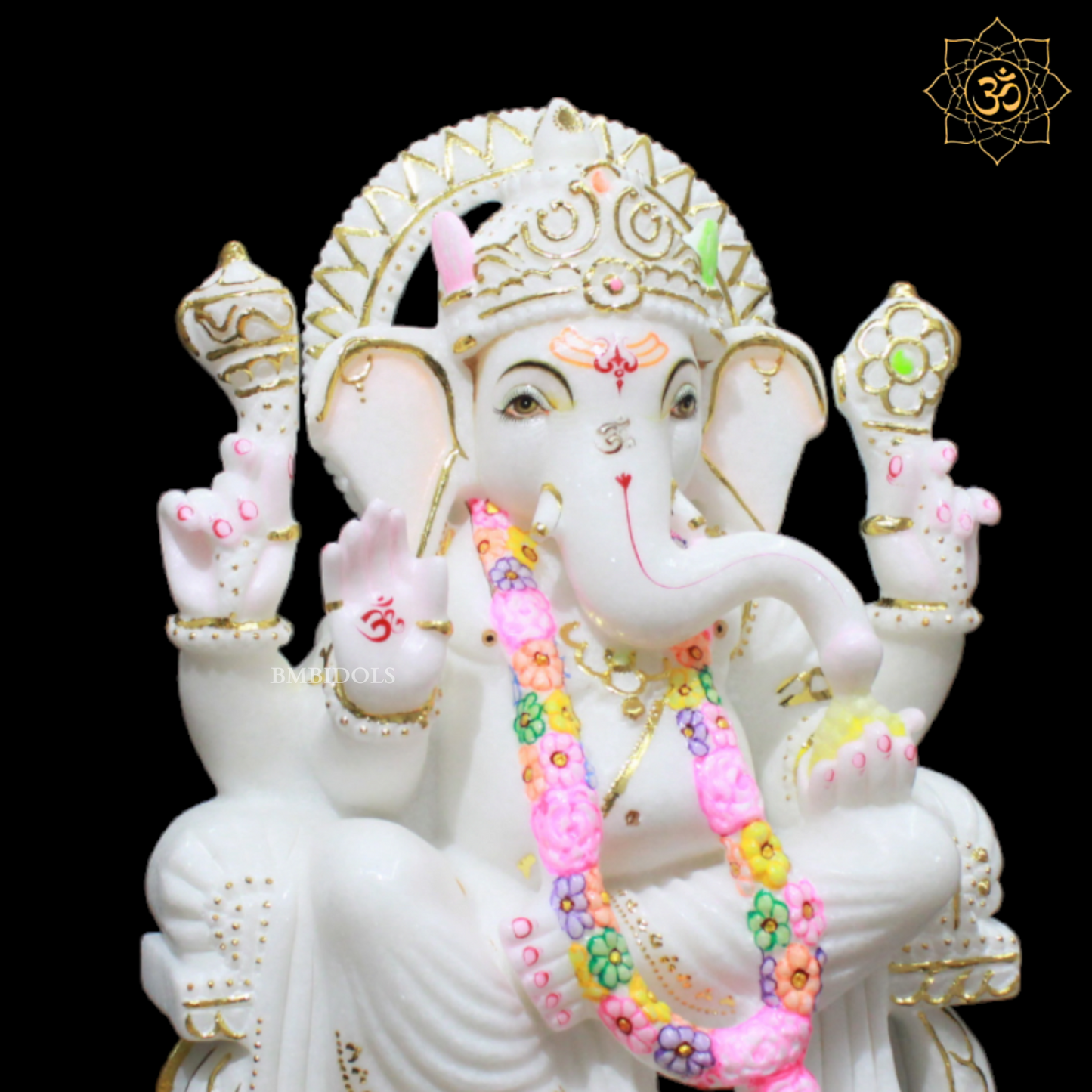 White Marble Ganesha Murti in Gold in Left side Trunk