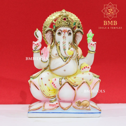 Marble Ganesha Murti sitting on the Lotus with Four Hands