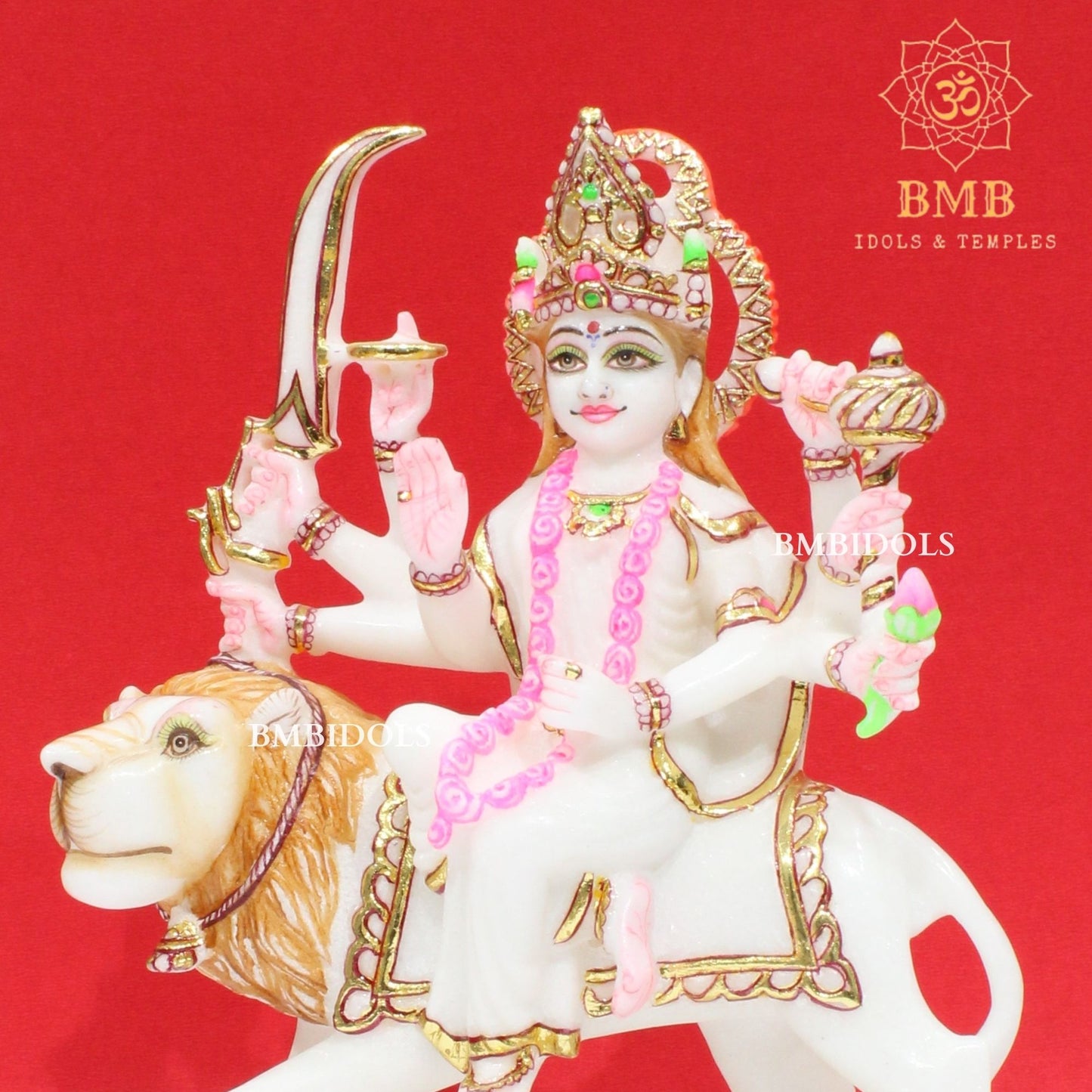 Marble Durga Murti with eight hands sitting on the Lion in Small Size